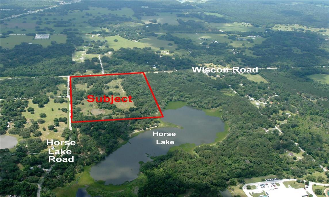28.7 Lake Front Acres which are Located at the NW Corner of Wiscon and Horse Lake Roads. Seller Feels this would be a Good Site for either a Retreat, Residential Development with 1/4 Acre Parcels or Investment with 1031. To keep from Over Building around the Lake, Seller will Consider Offers but is going to Reserve the Right to Restrict Development to Lots No Smaller than 1/4 Acre each. Contact Agent with Any Questions.