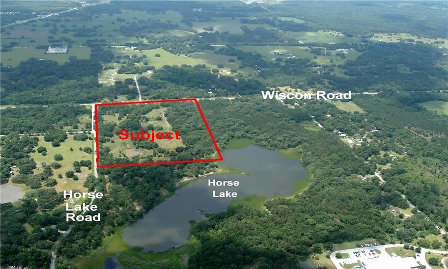 28.7 Lake Front Acres which are Located at the NW Corner of Wiscon and Horse Lake Roads. Seller Feels this would be a Good Site for either a Retreat, Residential Development with 1/4 Acre Parcels or Investment with 1031. To keep from Over Building around the Lake, Seller will Consider Offers but is going to Reserve the Right to Restrict Development to Lots No Smaller than 1/4 Acre each. Contact Agent with Any Questions.