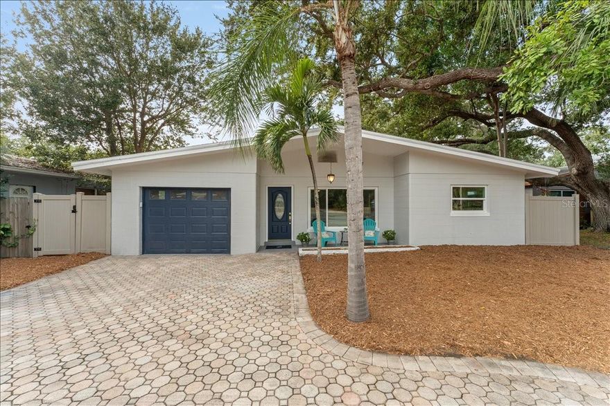 Beautifully updated 3BR home in highly desirable Jungle Beach, just moments from Jungle Prada Park, the boat ramp, and the waterfront. This home has been extensively upgraded for peace of mind with a NEW 2025 HVAC system, NEW 2025 electrical panel, NEW 2025 water heater, a 2018 roof, and newer windows and doors installed in 2016 and 2020.

Inside, the renovations shine. The brand-new kitchen features quartz countertops, shaker cabinetry, stainless-steel appliances, and a clean modern design. The bathroom has also been fully remodeled with fresh, stylish finishes. A welcoming front porch sets the tone, while the large screened back porch provides the perfect spot for relaxing or entertaining.

The fully fenced backyard offers mature landscaping, great privacy, and a storage shed. The home also includes a 1-car garage and a beautiful paver driveway that adds to the curb appeal.

Located in one of St. Pete’s most sought-after west-side neighborhoods, this home is close to the beaches, Treasure Island, Tyrone shopping and dining, and provides quick access to downtown. FHA/VA friendly and completely move-in ready, an exceptional find on Park Street.  *Photos of the second bedroom have been virtually staged*