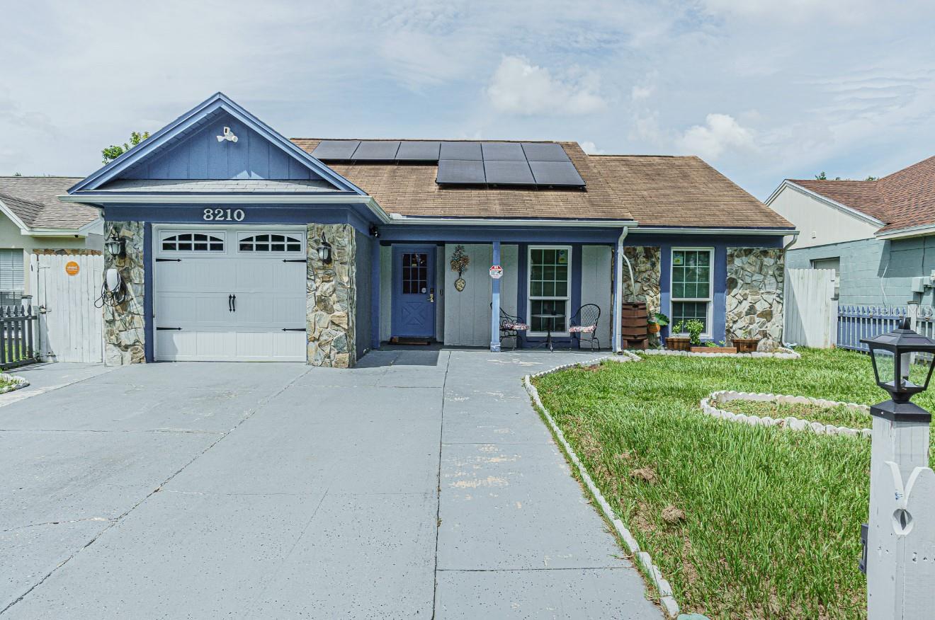 Step into this beautifully maintained 3-bed, 2-bath home where thoughtful upgrades meet everyday comfort. A newer roof (2018 with transferable warranty), A/C (2017), and brand-new interior/exterior paint make this home feel fresh and move-in ready. Energy efficiency shines with solar panels and updated storm proof windows, lowering utility costs while keeping the home cool and bright. The open living and dining area offers a warm, seamless flow, enhanced by tile and laminate flooring throughout. Outdoors, you’ll find a spacious yard designed with convenience in mind-including a custom dog house with built-in A/C, giving your pets their own oasis. This property blends practicality with peace of mind: updated systems, durable finishes, and rare features not often found at this price point. Conveniently located near Busch Gardens, USF, shopping, and dining, it offers both lifestyle and location. Whether you’re a first-time buyer or an investor looking for a turnkey home, this property checks all the boxes. Homes with this combination of updates and character are hard to find — don’t miss the chance to make it yours!
