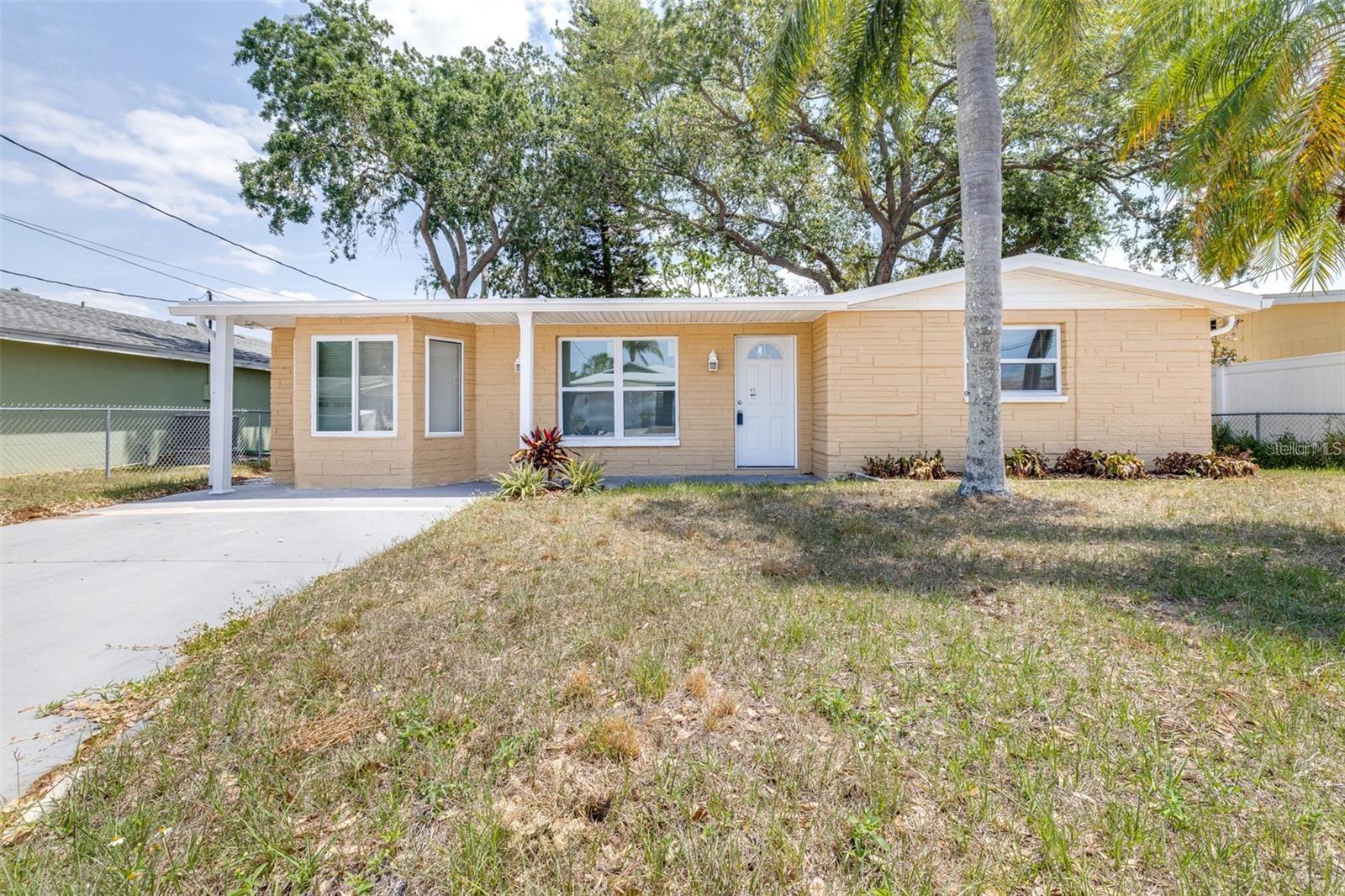 Welcome to your beautifully renovated, move-in ready waterfront home in Hudson Beach, where coastal living meets modern comfort. This charming 3-bedroom, 2-bath residence offers direct Gulf access with no fixed bridges and no HOA, making it ideal for boating, jet skiing, and fishing enthusiasts. The home features 1,443 square feet of open-concept living space, freshly painted inside and out, and showcases brand-new waterproof vinyl plank flooring throughout. Step into a bright and spacious family room that flows seamlessly into a fully updated kitchen, complete with white Shaker cabinetry, quartz countertops, a kitchen center island, and brand-new stainless steel appliances. A new French door leads to the air-conditioned Florida room, offering beautiful views of the water and direct access to a large backyard—perfect for relaxing evenings and enjoying vibrant sunsets. The seawall is ready for your future dock. The split-bedroom floor plan provides privacy, with two spacious guest bedrooms and a shared bathroom featuring a quartz-topped white Shaker vanity and a tiled bathtub on one side of the home, while the primary bedroom is tucked away on the opposite side, adjacent to a second full bath featuring a walk-in glass-enclosed shower and matching vanity. Additional updates include a roof less than four years old, a newer HVAC system under three years old, updated windows.New water heater, all-new drywall, baseboards, interior doors, french double door, electrical outlets, and fresh paint throughout the inside and outside, all completed in 2025. The home also features an inside laundry room with hookups. Ideally located just minutes from marinas, public boat ramps, waterfront restaurants, tiki bars, and a quaint local beach, this golf cart-friendly community also provides easy access to US-19, shopping, dining, and is just about an hour from Tampa International Airport. This home is a rare opportunity to enjoy the Florida lifestyle—schedule your private tour today!