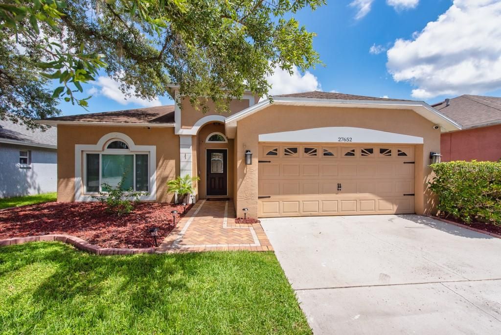 Photo of 27652 Sky Lake Circle, Wesley Chapel, FL 33544 (MLS # TB8401518)