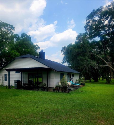 Photo of 15016 NW 32nd Avenue, Newberry, FL 32669 (MLS # OM702895)