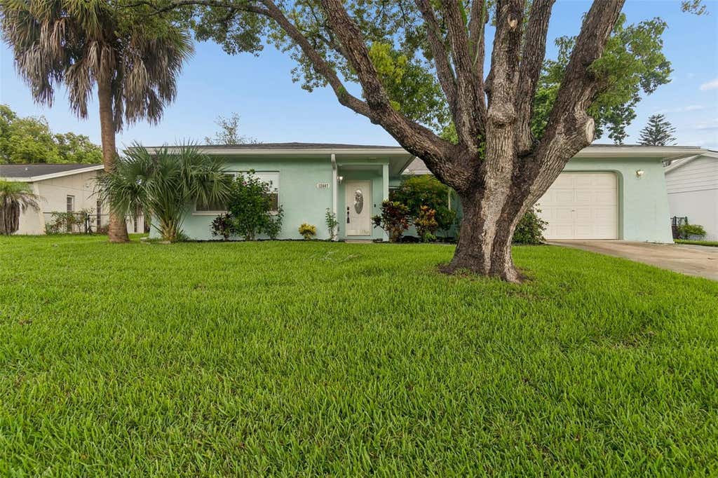 Photo of 12807 Willowdale Way, Hudson, FL 34667 (MLS # TB8534271)