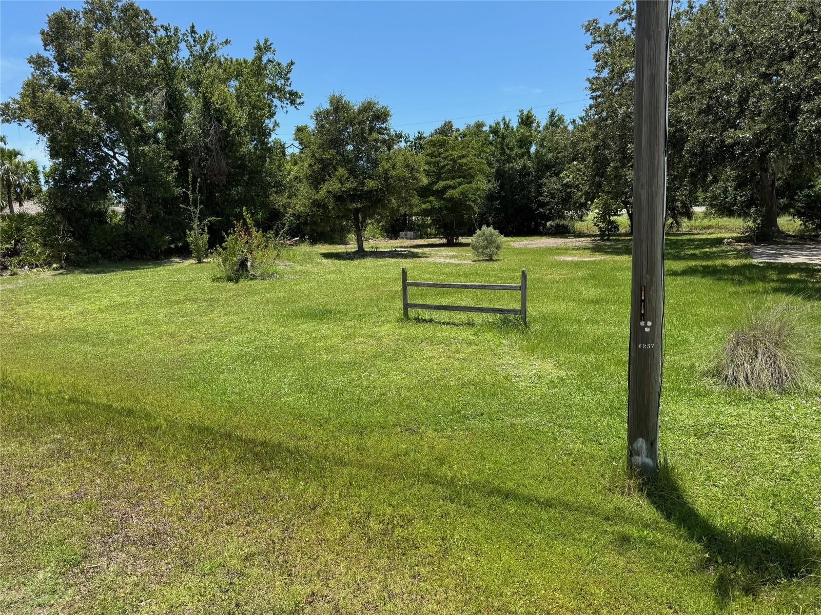 Mostly cleared vacant lot for sale in Englewood, Florida ready for a new owner to build their dream home. This is LOT#21 of Parcel ID#412003153008 aka 629 Richledge Street. The lot is the southern most lot of the 3 lots in the parcel. Lot will be separated at closing and has public water and sewer available. No well or septic! It is a very quiet residential street with lot of space between homes. Location is wonderful as it is only a mere 15 minutes away from the Famous Engelwood Beach on Manasota Key. The nearby Stump Pass Park is a stones throw away from Englewood Beach as well. the historic town of Englewood & well known Dearborn Street is great for local restaurants and shopping. The area provides tons of local events while the other famous Venice island and its own beaches are just a short simple drive away. Come and build your very own home and buy a piece of sunny Florida with this beautiful lot and live in paradise.