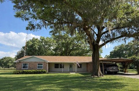 Photo of 13551 NE 14th Avenue, Citra, FL 32113 (MLS # OM724621)