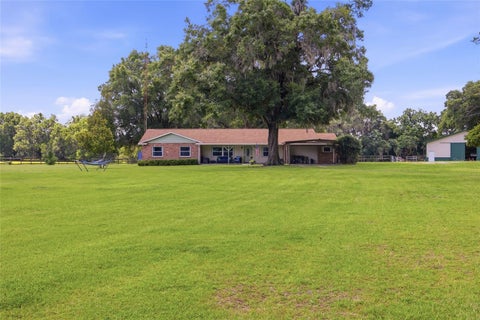 Photo of 13551 NE 14th Avenue, Citra, FL 32113 (MLS # OM724621)