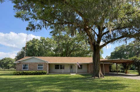 Photo of 13551 NE 14th Avenue, Citra, FL 32113 (MLS # OM724621)