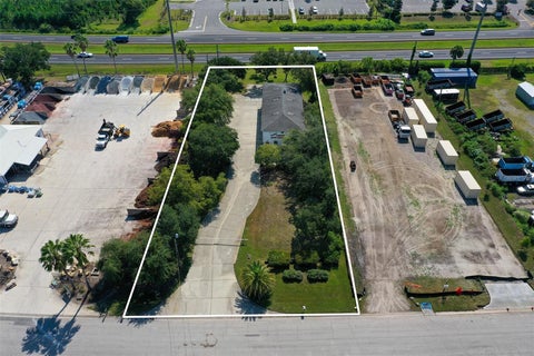 Photo of 10 Enterprise Drive, Bunnell, FL 32110 (MLS # FC321030)