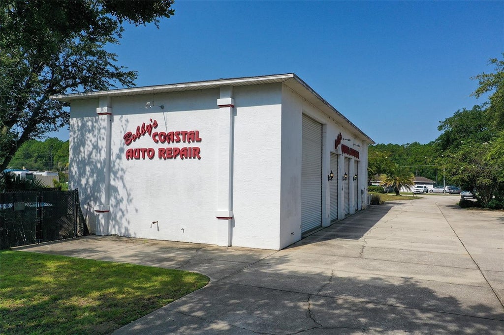 Photo of 10 Enterprise Drive, Bunnell, FL 32110 (MLS # FC321030)