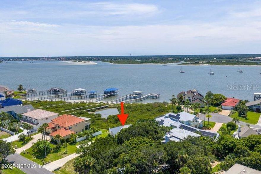 Million dollar water views of downtown St Augustine set the stage for this unique 2 story home. Enjoy Nights of Lights, 4th of July fireworks, amazing sunsets & daily boat traffic from both upper & lower decks, master suite, living room & dining room. The upstairs offers 2 bedrooms & 2 baths including a spacious master suite with panoramic water views. Living & dining areas feature hardwood floors & large windows that frame the scenery. Downstairs includes an enclosed garage with flexible space for storage, gym or hobby room, plus a separate 1 bedroom 1 bath suite with kitchenette, dining nook & living area perfect for guests or rental potential. Located within walking distance to the beach, popular restaurants, charming coffee shops & boutique shopping, this home offers an unmatched opportunity to experience the best of St Augustine living. Whether you're entertaining on the deck or watching the sunset over the water, this home is all about the view. Roof 2023, AC 2024.