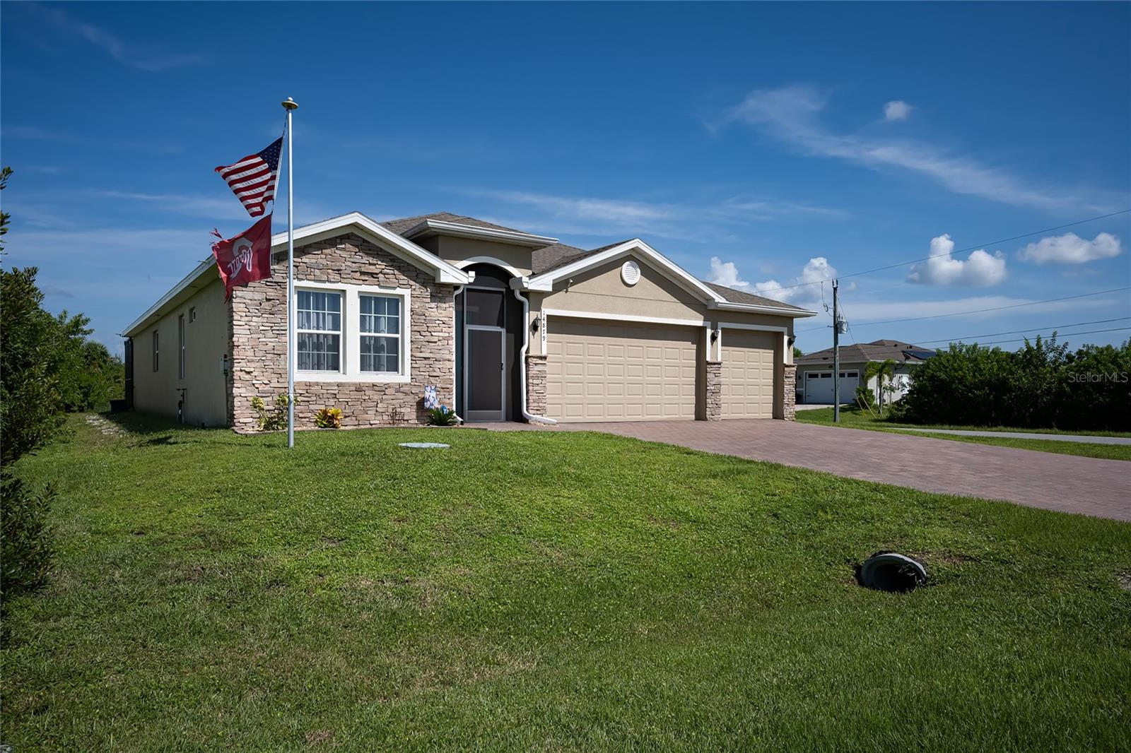 This 2396 sq. ft. of living area home will provide you with plenty of room to Enjoy the Florida lifestyle. With the 35 ft. long pool and 5ft. x 8 1/2 ft. spa you will feel like you're on vacation every day. A 3-car garage gives you plenty of room for your vehicles and hobby equipment. This is a true open concept design. As you enter the home there are two guest bedrooms and bath. Located at the back of the home is the very spacious Primary bedroom & bath which features a double vanity, his & her walk-in closets, garden tub, separate shower & water closet. A Den is also located at the back of the home which could also be used as a fourth bedroom with another bath located next to it. The middle of the home with high tray ceilings is a full open floor plan to spread out and great for entertaining. The open kitchen offers plenty of room & features a 4ft. x 8 1/2 ft. Island with granite counters. Stainless steel appliances, pantry & plenty of room to move around. The Utility room is just of the kitchen offers more storage and Maytag washer & dryer. As you head to the private setting of the pool area you will first have a covered lanai & opens up to a resort style salt water heated pool with spa to enjoy year-round. The pool also has a lounge area at one end and a beach style walk-in to the pool. On top of all this the home also comes turnkey furnished. The location is very private yet still is close to just about anything you could need. The community has a boat ramp & a community center. Boca Grande is just down the road with some of the most beautiful beaches in Florida. Plus, you have Englewood beaches, Restaurants, shopping, Entertainment & more. If you are looking for fishing this area is well known for great fishing. Including the Annual Boca Grande Tarpon Tournament. Make no mistake about it this is a home you will want to see.