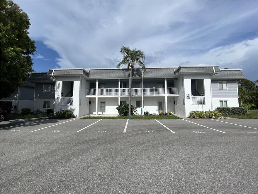 INCREDIBLE OPPORTUNITY - Huge Price Reduction! Unlock the potential of this Edgewater Village Condo that offers 2 Bedrooms, 2 Full bathrooms, and 1,040 square feet of living space. Ready for your personal touch, this unit presents a fantastic renovation opportunity. After sustaining minor water damage the lower drywall was removed, exposing the studs and is ready for you to Transform this space into Your slice of Paradise! Large Living room with Dining Area, Kitchen with Closet pantry. The primary bedroom has an Ensuite Bathroom and convenient slider access to the covered & screened-in Lanai. There is Nice-sized 2nd Bedroom and Guest Bath for Family & Friends.  Edgewater Village is an active community in Port Charlotte with a clubhouse, heated community pool, tennis/pickleball court, shuffleboard, bocce ball and an onsite Laundry Facility - Plus it's Pet-Friendly! Located just blocks from Charlotte Harbor and walking distance to the Charlotte Harbor Yacht Club. Just a short drive to the Port Charlotte Beach Complex, Bayfront Live Oak Park, the Sunseeker Resort, or explore the historic charm of Downtown Punta Gorda and Fisherman's Village with its boutique shops, dining, entertainment, and farmers markets. Southwest Florida offers endless opportunities - boating, world-class fishing, kayaking, golf, tennis, pickleball, arts and entertainment, Gulf Beaches, Barrier Islands and those unforgettable Gulf Coast sunsets. With Charlotte County's year-round appeal and its own easily accessible airport, travel is a breeze! Buy as a Primary Residence, Winter Retreat or Investment... ROI potential - other 2 bedroom condos in Edgewater Village are currently listed between $130-179K. Don't miss this opportunity! Schedule your appointment to view this condo today and start planning your renovation!