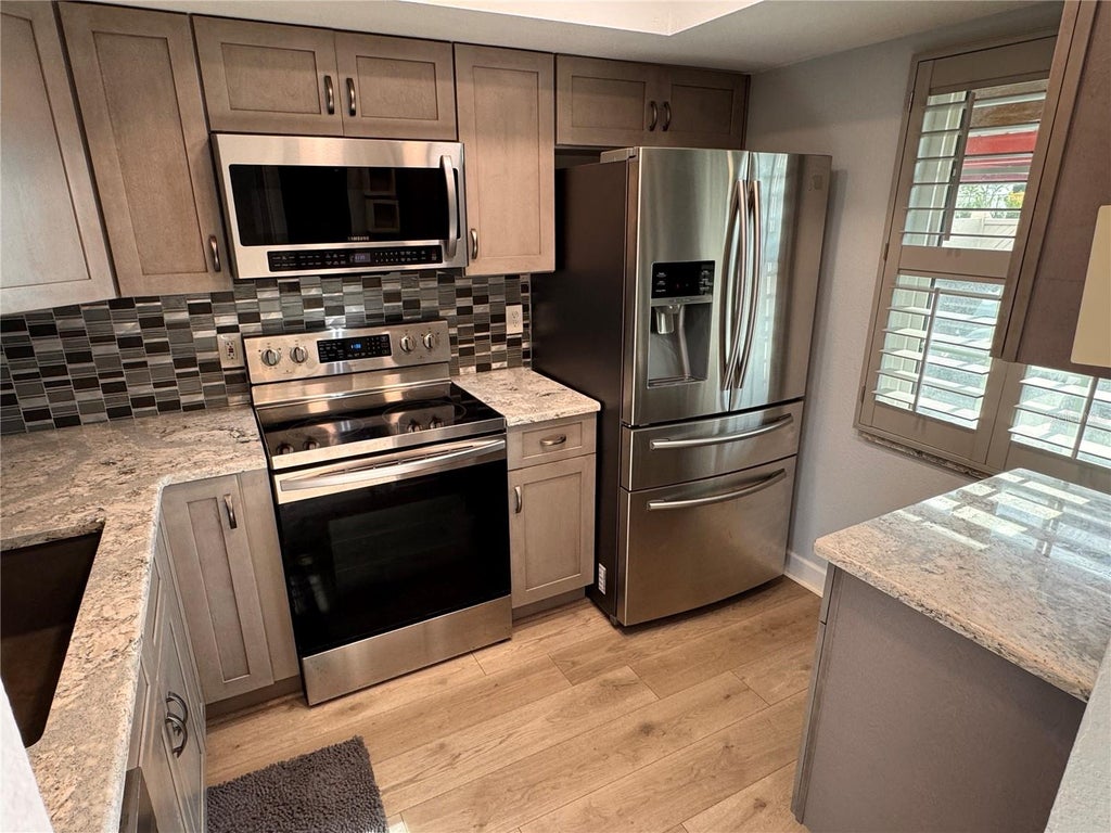 Photo of 601 N Hercules Avenue #1404, Clearwater, FL 33765 (MLS # TB8535802)
