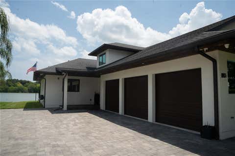 Photo of 995 Stacy Lane, New Smyrna Beach, FL 32168 (MLS # O6424542)