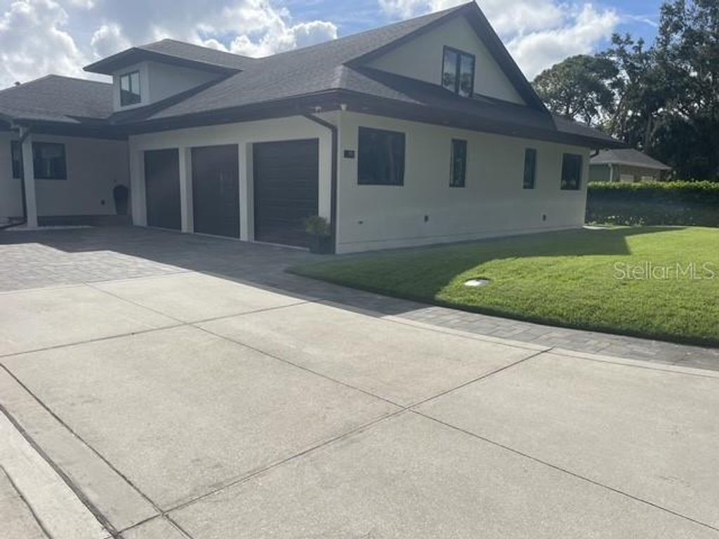 Photo of 995 Stacy Lane, New Smyrna Beach, FL 32168 (MLS # O6424542)