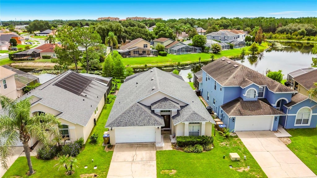 Photo of 2873 Blooming Alamanda Loop, Kissimmee, FL 34747 (MLS # O6435397)