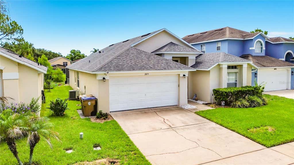 Photo of 2873 Blooming Alamanda Loop, Kissimmee, FL 34747 (MLS # O6435397)