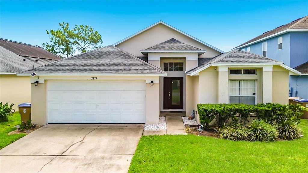 Photo of 2873 Blooming Alamanda Loop, Kissimmee, FL 34747 (MLS # O6435397)