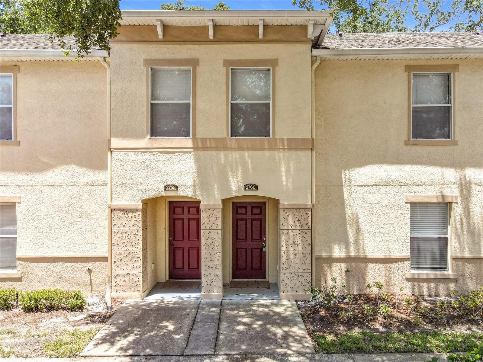 Welcome to 2760 Club Cortile Circle, a four-bedroom, three-bath unfurnished townhome located within the community at Club Cortile, a secure community with 24-hour gated access. The first floor features one of the four bedrooms with an en-suite bathroom, along with a spacious open-concept family room and kitchen. The primary bedroom is on the second floor, complete with a private bathroom that includes a garden tub and a separate shower. Additionally, there are two more bedrooms and a third bathroom on this floor. This townhome is conveniently located within twenty minutes of Disney World and is close to shopping centers, dining options, and major highways. The community offers a clubhouse with a fitness center, tennis courts, and a playground. It is suitable for Airbnb rentals, long-term leasing, or as a personal residence. Please contact me, Susan. Cook today.