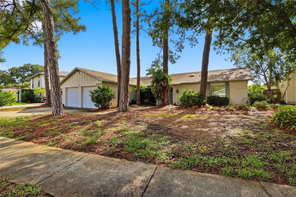 Photo of 6811 Twelve Oaks Boulevard, Tampa, FL 33624 (MLS # TB8531052)