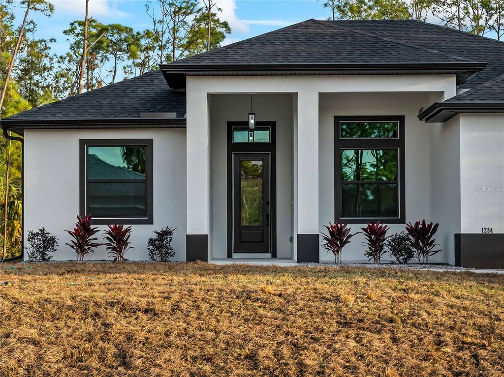 Photo of 1284 Rambler Terrace, Port Charlotte, FL 33953 (MLS # C7522318)