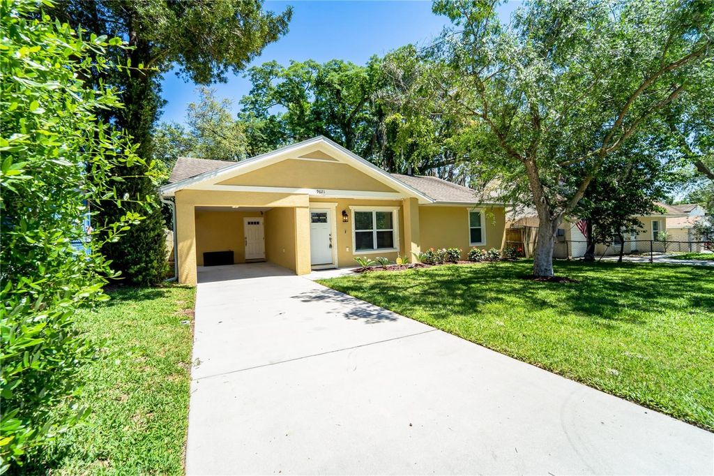 Photo of 9621 N 46th Street, Tampa, FL 33617 (MLS # TB8506031)