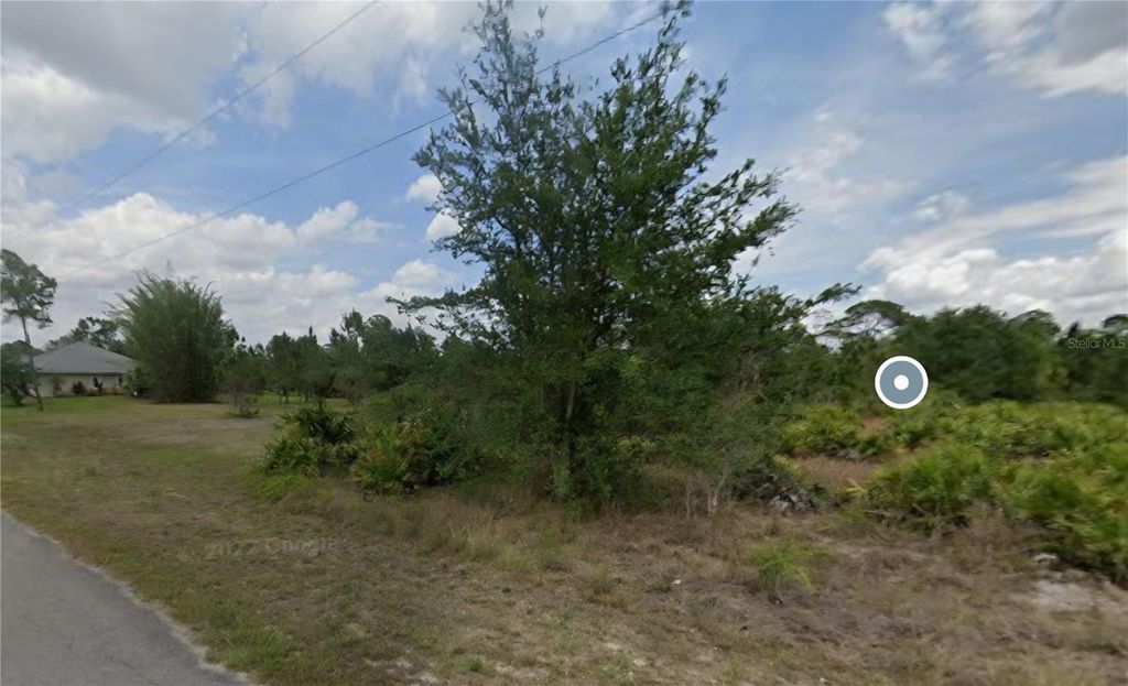 Photo of 1102 Jefferson Avenue, Lehigh Acres, FL 33936 (MLS # R4909698)
