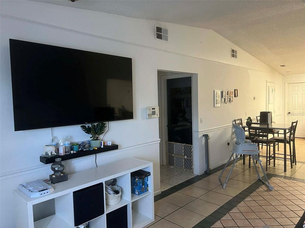 Photo of 1081 Woodman Way, Orlando, FL 32818 (MLS # S5140430)