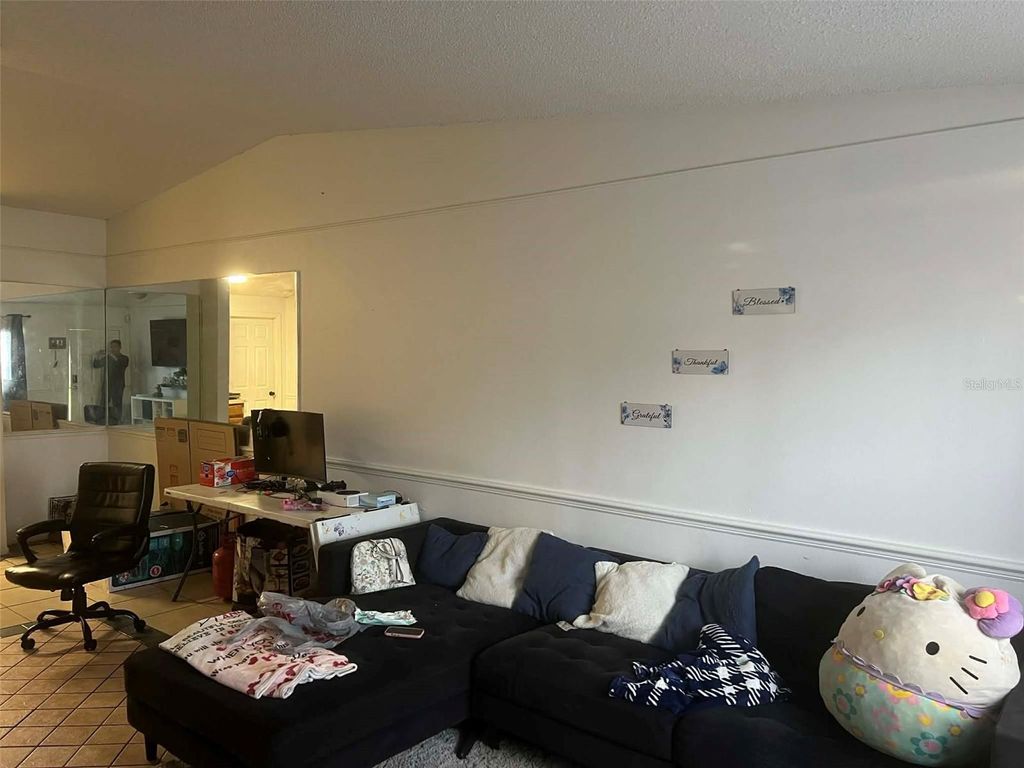 Photo of 1081 Woodman Way, Orlando, FL 32818 (MLS # S5140430)