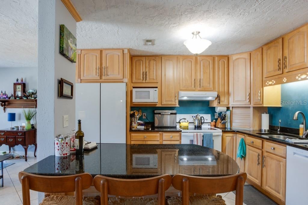 Photo of 2100 8th Avenue SW, Largo, FL 33770 (MLS # TB8515095)