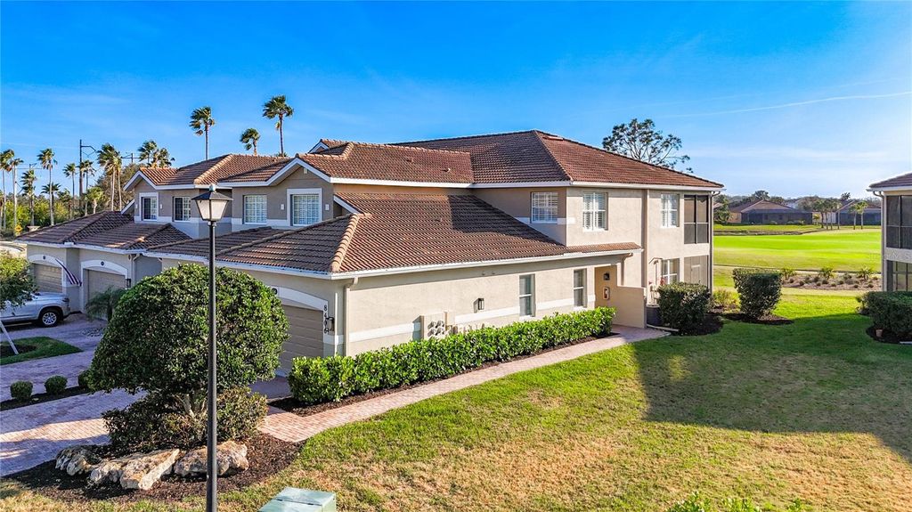 Photo of 8406 Grand Estuary Trail #104, Bradenton, FL 34212 (MLS # A4682959)