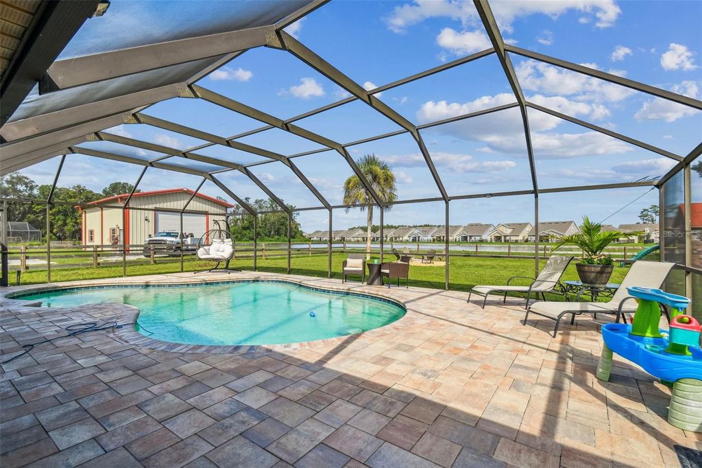 Photo of 6101 Old Pasco Road, Wesley Chapel, FL 33544 (MLS # TB8433793)