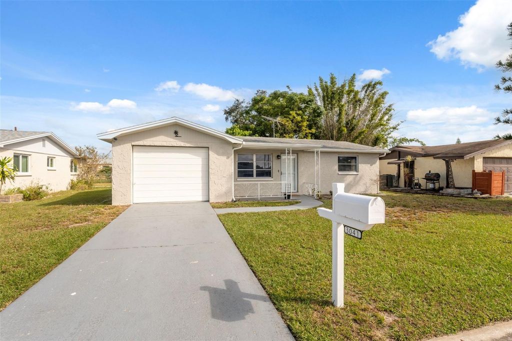 Photo of 3041 Fairmount Drive, Holiday, FL 34691 (MLS # W7879373)