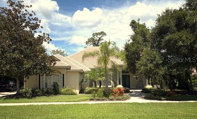 A beautiful LAKE FRONT home in the exclusive Gated Estates of DeBary Plantation, home of DEBARY COUNTRY CLUB! This CUSTOM-BUILT residence offers an amazing location with incredible views of the Lake and country club. The home offers an impressive array of features that make it a standout amongst other homes in this price range. Plenty of space and tons of potential to make this home your own. Formal Dining Room, Kitchen, Dinette, Family Room, Office/Bonus Room, Master Suite plus 2 additional Bedrooms and additional 1 1/2 Bathrooms and a Laundry room. The Master Bath has a garden soaking tub and a separate walk in shower. There are also DUAL sinks, large walk in closet and a WATER CLOSET for desired additional privacy. The kitchen is a delight with a GAS COOK TOP, a convenient BREAKFAST BAR and a charming dinette area. Dining Room as well as a large Family Room with soaring 12 foot high ceilings with recessed lighting and a gas fed FIREPLACE which can also be enjoyed in the office/bonus room. When you step out onto the patio and enjoy the STUNNING SCENERY that overlooks the LAKE, GOLF COURSE and COUNTRY CLUB with a OBSERVATION DECK for even better views. A great opportunity is here to buy a LAKE HOME with numerous POSSIBILITIES to make it your own special oasis.