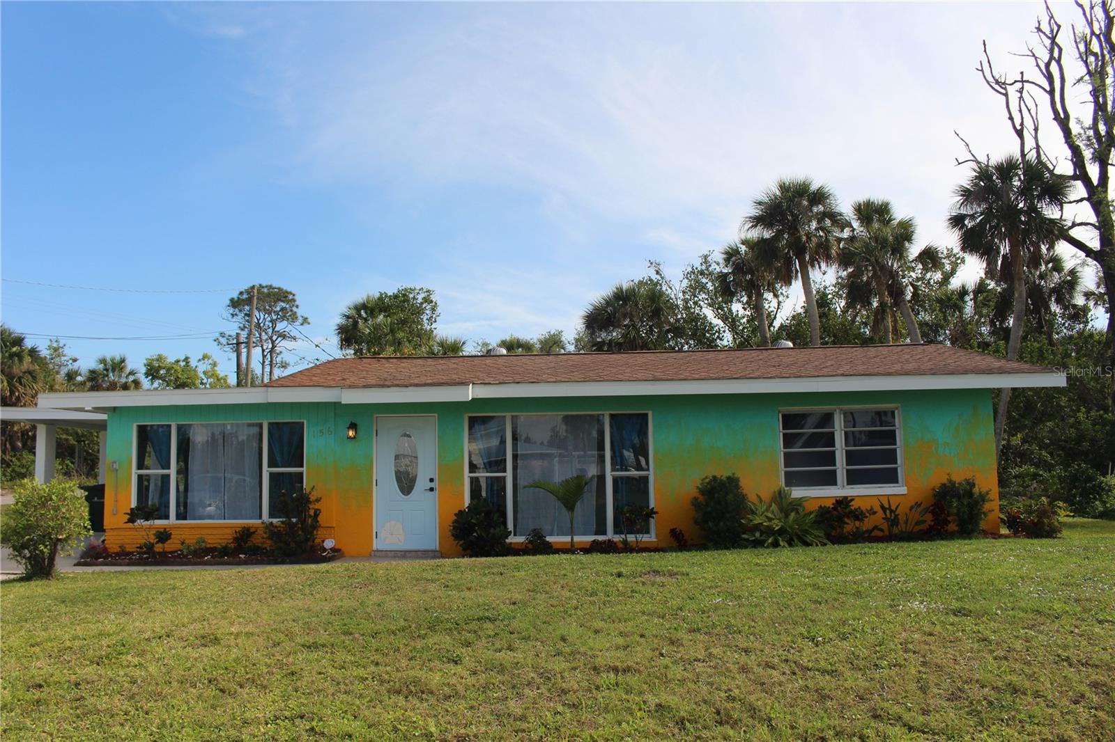 Rare opportunity in Venice with no HOA and a deeded boat slip offering direct access to a saltwater canal and open water. Situated on a spacious corner lot, this beautifully updated 3-bedroom, 2-bath concrete block home blends coastal charm with modern convenience. The property includes Lots 33 and 35A, providing extra space and flexibility. The kitchen has been fully renovated with all new appliances and waterproof soft-close cabinetry. Both bathrooms have been updated with stylish, contemporary finishes. Major systems have been upgraded with new plumbing and electrical, and all interior doors have been replaced. The home also features custom steel weatherproof exterior doors for added security and durability. Built with sturdy concrete block construction, the home is designed to withstand Florida’s climate. An exterior shed provides additional storage, while the artesian well offers an eco-conscious water source—perfect for those interested in sustainable living. The home has been freshly painted inside and out, with a modern gradient exterior. The private yard is lush and tropical, framed by mature palm trees, creating a peaceful outdoor space for relaxing or entertaining. Located just minutes from Myakka State Forest, this home also offers convenient access to shopping, dining, and beaches. Walk to the popular Tarpon Point Grill & Marina, or take a short drive to the Gulf coast. Ideal for boaters, nature lovers, or full-time residents seeking a move-in-ready home with character and charm. Professional photos coming soon!