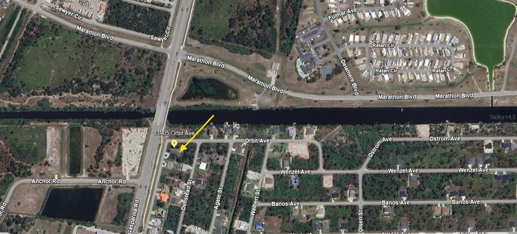 Photo of 13905 Orbit Avenue, Port Charlotte, FL 33981 (MLS # C7513095)