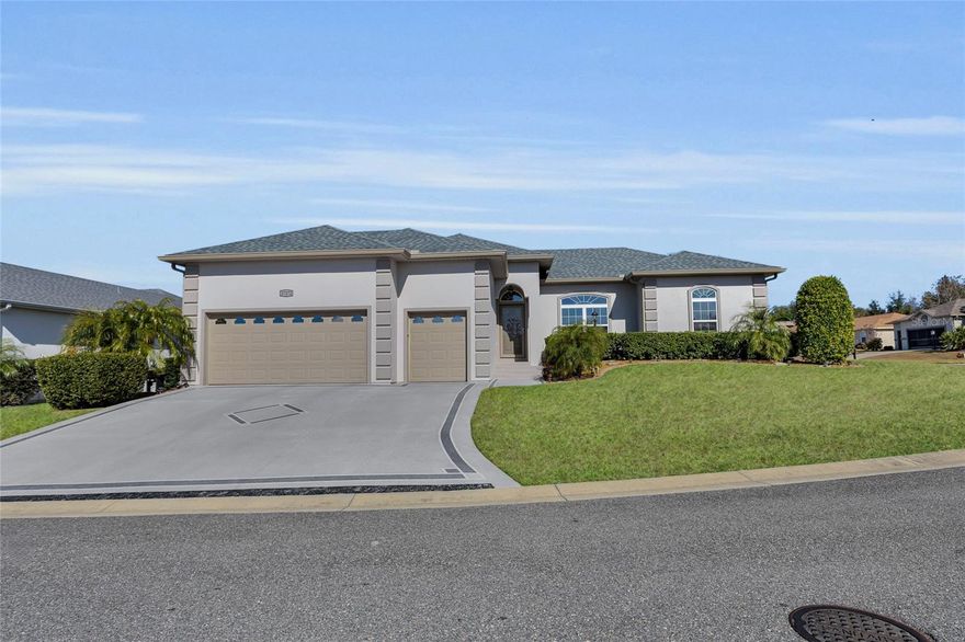 This HOME sits on a beautifully landscaped CORNER LOT in the 55 PLUS Gated Community of Stonecrest. Inside you will find 10 foot ceilings with an Open Floor Plan. The Home is being sold FULLY FURNISHED. The Kitchen (and bathrooms)have granite countertops. The Kitchen has plenty of countertop and cabinet space. The Kitchen flows into the adjacent dining room area and great room allowing easy interaction with guests or family while cooking and entertaining. The spacious PRIMARY SUITE is thoughtfully separated from the secondary bedrooms, creating a private retreat with its own en-suite bathroom. The Additional BEDROOMS are conveniently located on the opposite side of the home- ideal for family, guests, or a home office. The INSIDE Laundry room is located off the kitchen area. Enjoy your morning or evening on the Enclosed Lanai that has privacy from the back neighbors. The garage is 12'6" high; allowing room for a parking lift that can park two cars ( makes a two car garage a three car garage.) Garage door openers are High LiftMaster with battery backup. And of course there is a golf cart garage. Floors are CVT vinyl tile in a checkerboard pattern. The thermostat, irrigation, and garage doors are Wi-Fi controllable. The Community has plenty of daily activities, Golf Course, Restaurant, FOUR Swimming pools, Tennis court, Pickleball, and much more!