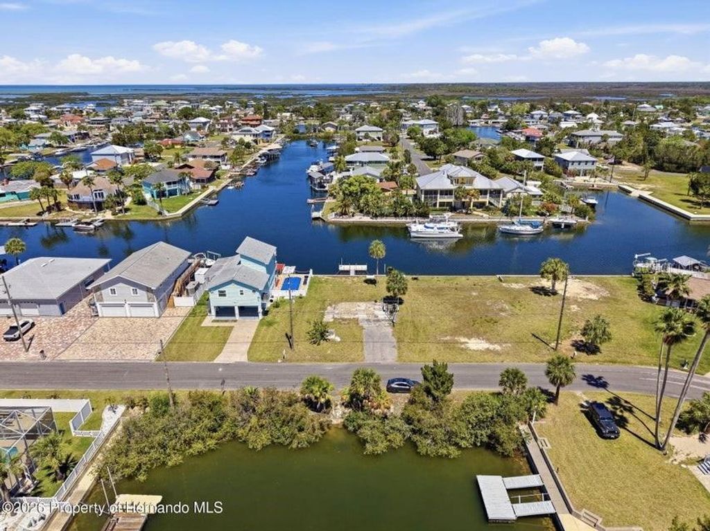 Photo of 3473 Gulf Coast Drive, Hernando Beach, FL 34607 (MLS # W7884591)