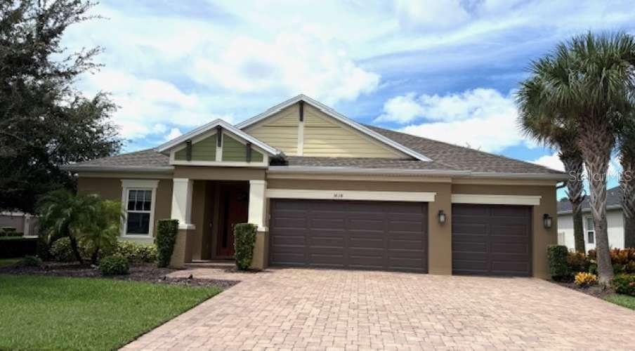 Tastefully decorated and well-maintained 4 bedroom, 3 full bath, office/den home on a corner lot located in peaceful Arbor Chase gated community. Well thought out floor plan. Spacious foyer, rotunda leading to front entrance, bedroom (4) with updated ensuite, living room and kitchen. Office/den has glass French doors which is large enough to convert to a bedroom if needed. Light and bright dining room has stylish wainscoting and attractive, obscure window film eliminating the need for blinds. Substantial size eat-in kitchen, 2025 Bespoke appliances, including extra deep refrigerator, micro/convection oven combo and lower oven, dishwasher with storm wash, Z Line 6-burner gas stove and dove tail wood cabinets. The open kitchen includes 42” tall cabinets, large prep island, walk in pantry and separate island with seating, all quartz counter tops. Large living room with 12’ pocket sliding glass doors. Removable insert for doggie door. Seller will remove upon request. Large master bedroom with hallway leading to 2 large walk-in closets and updated master ensuite. Separate his and hers vanities, soaker tub, private water closet and walk-in shower with 2 shower heads including a rainfall shower head and seating. Additional sizeable bedrooms (2 & 3) that share an updated hall bath. Covered lanai with no-see-um screen has brick paving with ample space surrounding the solar-heated, salt water pool. Lanai and living room has pre-wired speakers. Home includes a water softener, water purification system, pest control system, fenced in yard, high efficiency AC system (coil replaced 2025), tankless water heater, hurricane shutters, and security system. Interior painted and bedroom carpets replaced in 2022. Entire exterior painted in 2023. Close to Honeymoon Island, Clearwater Beach, Tarpon Springs Sponge Docks and Tampa International Airport. FLORIDA RESIDENTS don’t forget about the tax portability to lower the real estate taxes.
