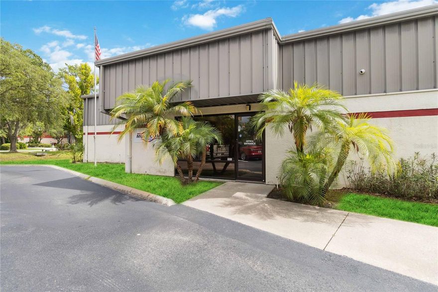 KW Commercial is proud to present for the first time on the market in almost 30 years, 1076 Florida Central Parkway Longwood Fl.  This 14,317 sq/ft industrial building and office space consists of a combination of 2 separate industrial warehouse spaces, as well as a large fully functional office space.  The office space is approximately 3934 sq ft.  In it's current configuration, the office space includes 13 offices, one meeting space, a break room and three bathrooms.  It has public men's and women's bathrooms as well as one private office bathroom.  Please see the floorplan and Matterport dollhouse for current configuration.  There are two attached industrial warehouses.  The one directly attached to the office space is approximately 4383 sq ft.  It has a middle ceiling height of 16' and and end height of 11'.  It has two single exit doors, one set of double doors, and two grade level roll up doors of 12x10 and 8x9.  It has a fully air conditioned computer space.  The two warehouses are separated by a covered dock high tractor trailer bay that feeds both warehouses.  Both warehouses are on three phase power.  The second warehouse is 6,000 sq/ft with a middle ceiling height of 20'  and end height of 16'.  It has three exit doors and two grade level roll up doors of 10.5'x11 and 12.5'x14'  This warehouse comes with two restrooms for men and women.  The property sits on 1.34 acres.  Come make this your company's new home.