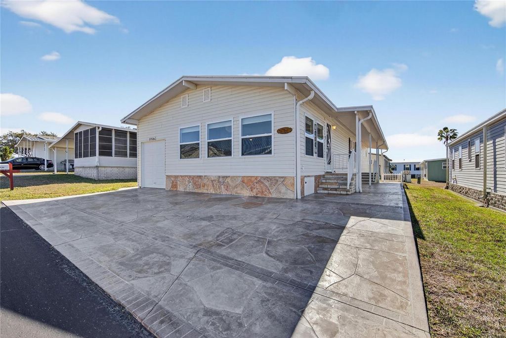 Photo of 37526 Rio Lane, Zephyrhills, FL 33541 (MLS # TB8465722)