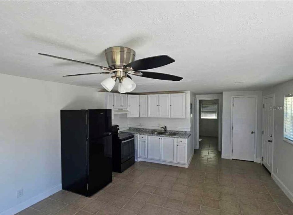 Photo of 917 E 121st Avenue, Tampa, FL 33612 (MLS # TB8466358)