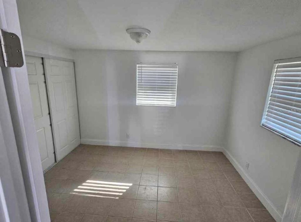 Photo of 917 E 121st Avenue, Tampa, FL 33612 (MLS # TB8466358)