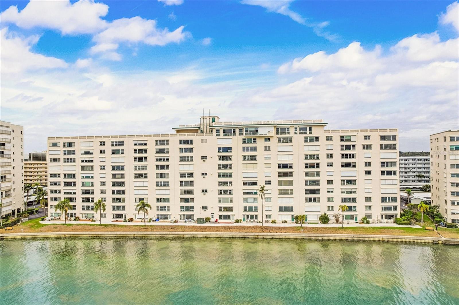 Spacious 1BR/1.5BA condo located in the highly desirable 55+ waterfront community of Town Shores in Gulfport. Situated on the 7th floor, this unit offers stunning panoramic views of Boca Ciega Bay with endless potential to make it your own. Watch dolphins, manatees, and sunsets from your window!
The interior is ready for your updates, making it the perfect blank canvas to create your ideal Florida retreat. Enjoy the convenience of a covered carport (recently replaced in 2025) and a pet-friendly building where both cats and dogs are welcome.
Town Shores offers resort-style amenities including heated pools, tennis, pickleball, shuffleboard, bocce, fitness center, two marinas, kayak storage, library, billiards, saunas, clubhouse with kitchen, and more. Monthly HOA includes cable, internet, water, sewer, trash, gas, and building insurance—just pay electricity!
Located just blocks from Historic Downtown Gulfport with restaurants, shops, the beach, and year-round events. Close to St. Pete Beach, Fort DeSoto, and downtown St. Petersburg.
Don’t miss this opportunity to own in one of Gulfport’s most vibrant waterfront communities!