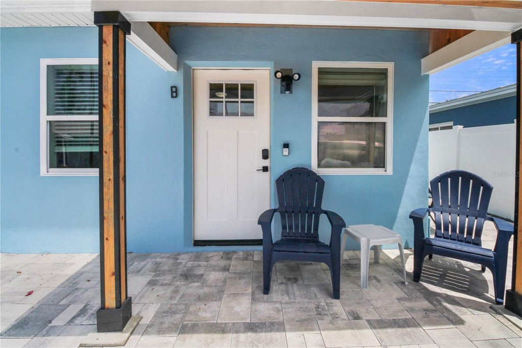 Photo of 255 146th Avenue E, Madeira Beach, FL 33708 (MLS # TB8555056)