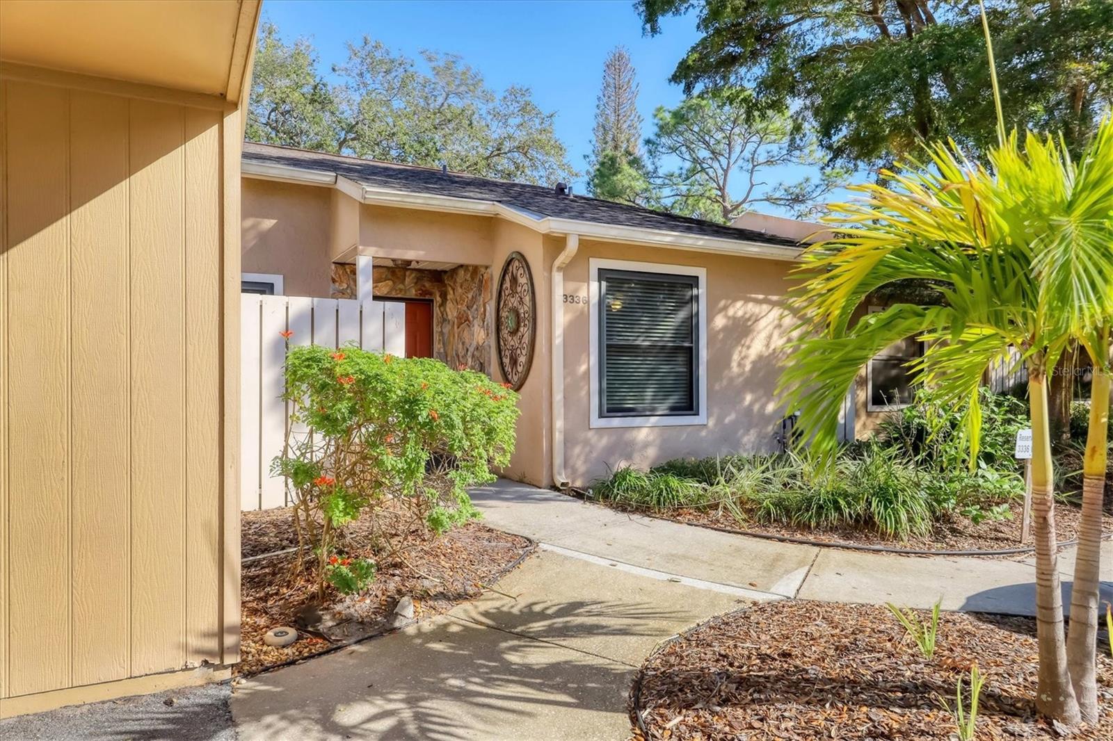 Charming Wheelchair-Accessible Villa in Tallywood
Enjoy easy, maintenance-free living in this spacious 2-bedroom, 2-bathroom villa in the desirable 55+ community of Tallywood in Sarasota. Designed for comfort and accessibility, this home features an ADA-compliant primary bathroom and a step-free open floor plan.
Enter through the covered carport, which includes a private storage room, with additional guest parking conveniently nearby. Inside, the villa boasts a bright and airy layout, perfect for relaxed Florida living. Tallywood offers a pet-friendly environment with amenities, including a dog park, clubhouse with a library and meeting room with kitchen, BBQ grill, shuffleboard court, and an exercise room. Residents can also enjoy the screened-in, solar-heated pool and an active social calendar.
This prime Sarasota location is just minutes from the newly renovated Bobby Jones Golf Course, Publix shopping center, Ed Smith Stadium (Orioles Spring Training), Nathan Benderson Park, and the UTC Mall with endless dining and shopping options. Plus, Sarasota’s world-famous beaches, including Siesta Key and Lido Beach, as well as St. Armands Circle and SRQ Airport, are all within a short drive.