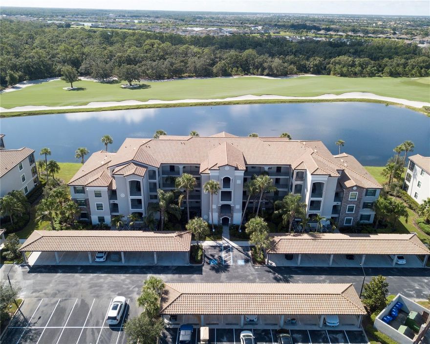 Now Priced UNDER $300,000! 
This is your golden ticket to one of the most affordable condos in Lakewood National – and it comes FULLY FURNISHED with a GOLF MEMBERSHIP included unit! Overlooking the scenic golf course & preserve, this stylish 2-bed, 2-bath condo is your perfect slice of Florida paradise. Whether you're downsizing, snow birding, or investing (yes, 30-day rentals are allowed!), this place checks all the boxes.
What’s inside-screened-in balcony and take in the tranquil lake and golf course views. 

The kitchen is a chef’s dream with:
Solid wood cabinetry, Granite counters & stainless-steel appliances, Island with seating for 3+, Stylish pendant and chandelier lighting

Your spacious primary suite offers plush carpet, a large walk-in closet, and a private en-suite bath with walk-in shower. Guests? They’ll love the comfy second bedroom and nearby full bath.

Peace of mind features include- Impact windows & doors,2024 motion-sensor light at the front door, Surge protection, Private storage closet just outside your unit, Covered carport, Elevator access, Second-floor convenience with beautiful views.

What’s included in the HOA? Practically everything! Cable, internet, water, sewer, pest control, building maintenance, and your own exclusive condo pool just steps away.
FULL ACCESS to Lakewood National's luxury amenities:2 Arnold Palmer-designed championship golf courses, Clubhouses & resort-style pool
8 tennis courts, 4 pickleball courts, State-of-the-art fitness center, spa & on-site restaurant.
Located in the heart of Lakewood Ranch, the #1 multi-generational community in the U.S. for seven years running – close to top schools, dining, shopping, parks, and beaches!
