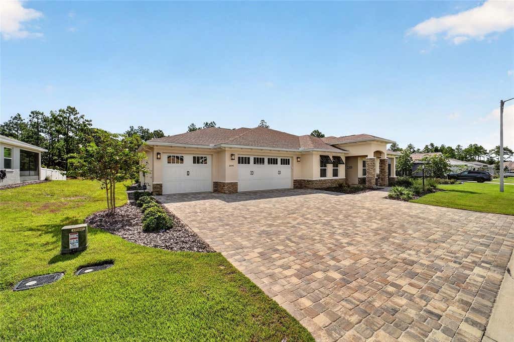 Photo of 10050 SW 106th Circle, Ocala, FL 34481 (MLS # OM730623)