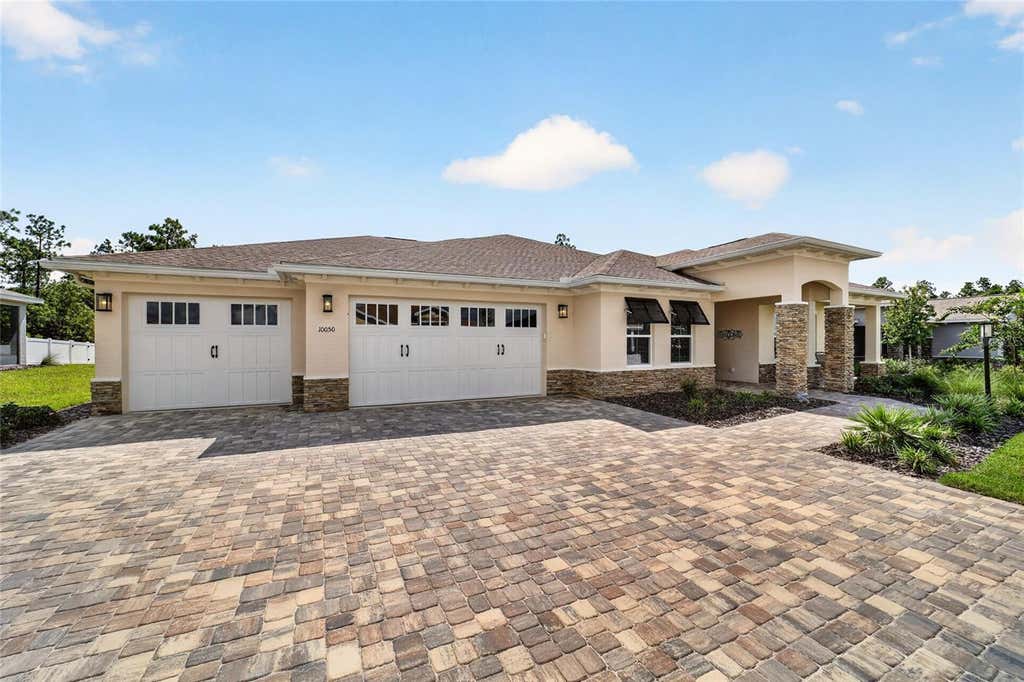 Photo of 10050 SW 106th Circle, Ocala, FL 34481 (MLS # OM730623)